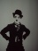 Charlie Chaplin ist Lebensgroß an meiner Küchenwand ( es ist bedingt durch eine Wendeltreppe im Flur ein Rundbogen, wo man sonst schlecht etwas aufhän